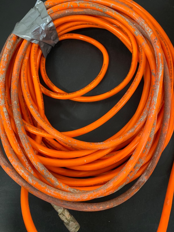 Photo 2 of SANFU Polyurethane(PU) Reinforced 3/8”ID x 100ft Air Hose, Reassembled, Wear Resistant 300PSI with 3/8” Repaired Industrial Quick Coupler and Plug, Bend Restrictor, Orange-ITEM IS USED / MAY BE MISSING PARTS
