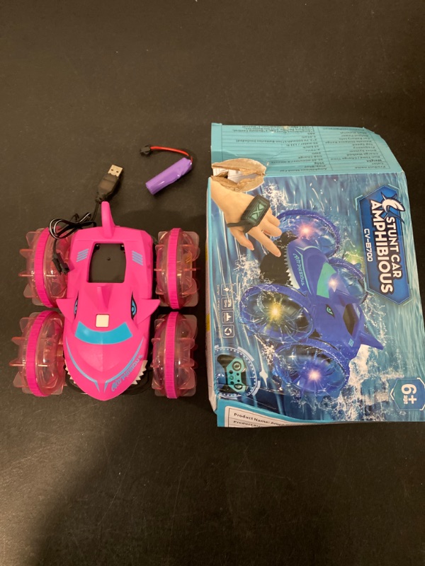 Photo 4 of Amphibious RC Car with Lights for Kids 3-12 Year Old Girls Toy Gesture Hand Controlled Remote Control Boat 4WD 2.4 GHz Waterproof RC Stunt Car 360° Rotating Water Beach Pool Toys Gifts for Girls Kids-ITEM IS NEW BUT MAY BE MISSING PARTS

