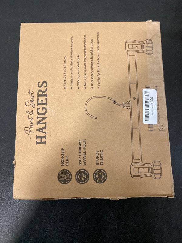 Photo 1 of Hanger Central Space Saving Heavy Duty Slim Plastic Pants and Shorts Hangers, Ridged Non-Slip with Pinch Clips, 360-Rotating Chrome Swivel Hook, in Black, 10 Pack, 10 Inches
