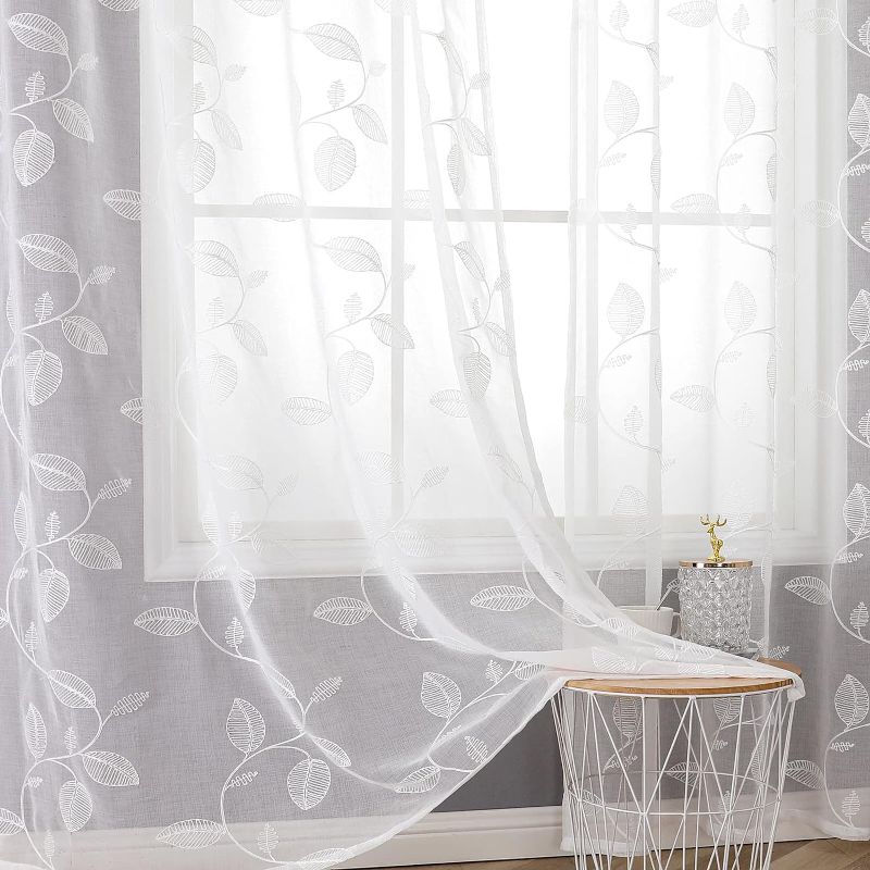 Photo 1 of BGment White Sheer Curtains 63 Inches Length 2 Panels for Living Room, Light Filtering Embroidered Sheer Drapes Faux Linen with Grommet, Each Panel 52 x 63 Inch, White
