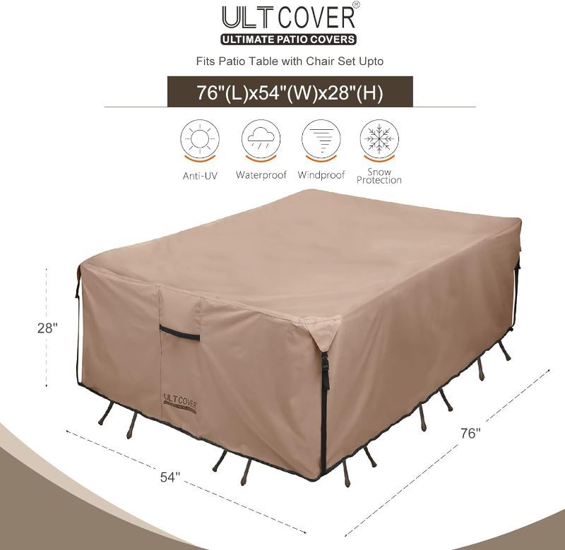 Photo 2 of ULTCOVER Rectangular Patio Heavy Duty Table Cover - 600D Tough Canvas Waterproof Outdoor Dining Table and Chairs General Purpose Furniture Cover Size 76L x 54W x 28H inch