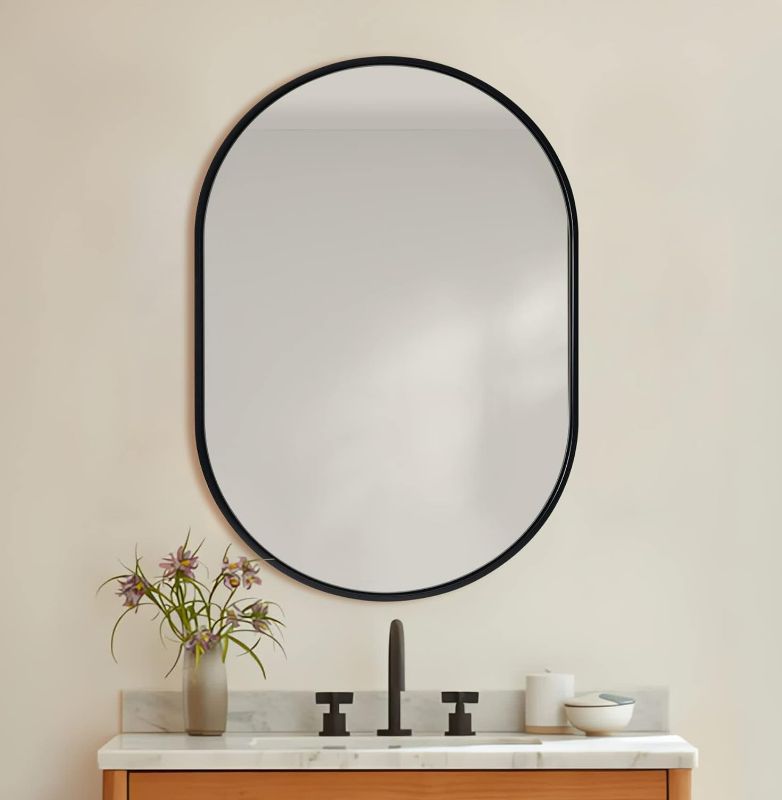 Photo 1 of ANDY STAR Oval Mirrors for Bathroom, 20x30 Inch Black Pill Shaped Mirror, Matte Black Oval Mirror for Bathroom with Modern Metal Frame, Vanity Mirror for Wall Hangs Horizontally or Vertically
