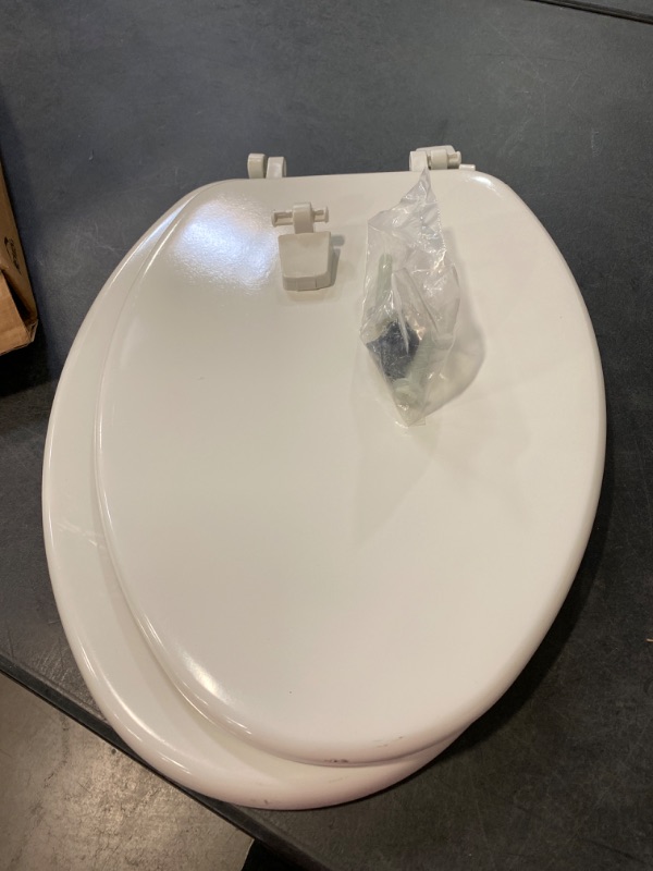 Photo 1 of BEMIS 1400TTA 000 Economy Toilet Seat, ELONGATED, Durable Enameled Wood, White MINOR SCRATCH
