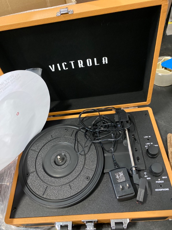 Photo 2 of Victrola Vintage 3-Speed Bluetooth Portable Suitcase Record Player with Built-in Speakers, Upgraded Turntable Audio Sound, Cognac Cognac Record Player