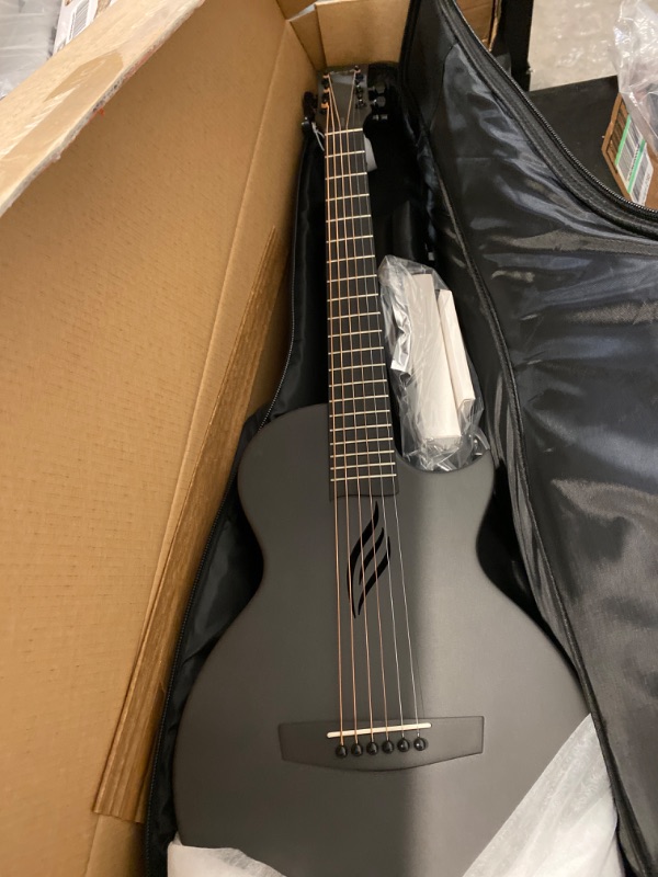 Photo 2 of Enya Nova Go Carbon Fiber Acoustic Guitar 1/2 Size Beginner Adult Travel Acustica Guitarra w/Starter Bundle Kit of Colorful Packaging, Guitar Strap, Gig Bag, Cleaning Cloth, String(Black)
