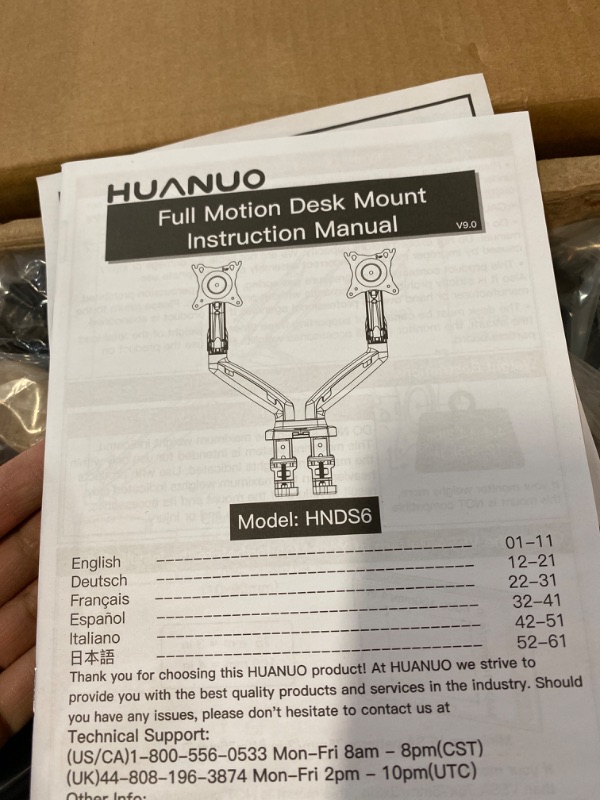 Photo 2 of HUANUO Dual Monitor Stand - Adjustable Spring Monitor Desk Mount Swivel Vesa Bracket with C Clamp, Grommet Mounting Base for 17 to 27 Inch Computer Screens - Each Arm Holds 4.4 to 14.3lbs
