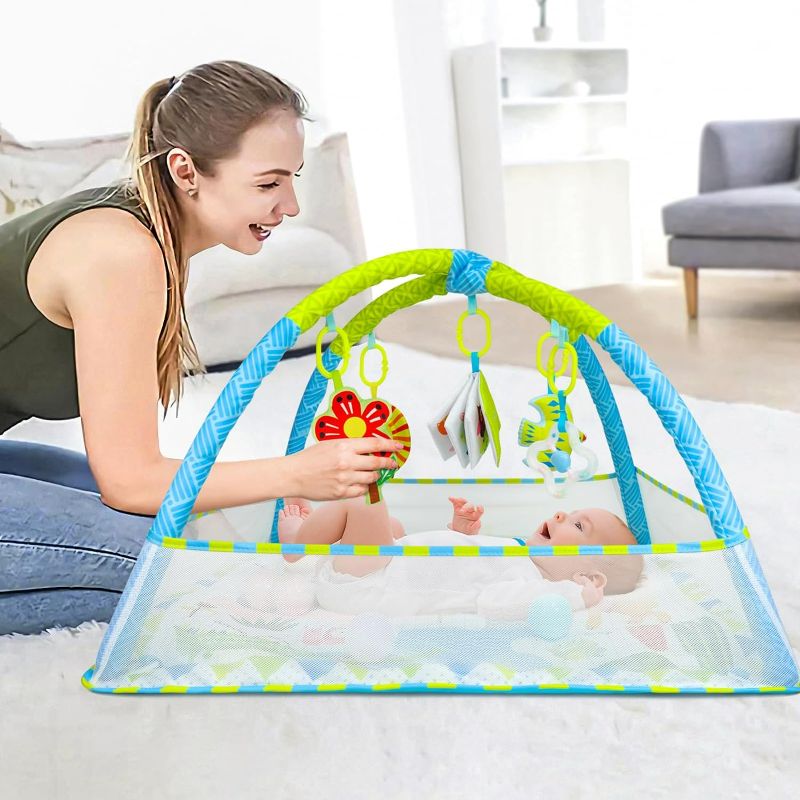 Photo 2 of Dr.Rapeti Baby Play Gym Mat with Ball Pit Activity Gym Center Tummy Time Mat Thickened Mat Sensory Exploration Motor Skill Development for Newborn Infant Baby Toddlers
