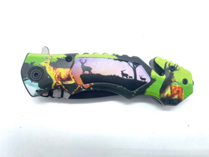 Photo 1 of SE Spring Assisted Clip Point Folding Knife  Window Breaker And Seatbelt Cutter- Multi Colored W Deer