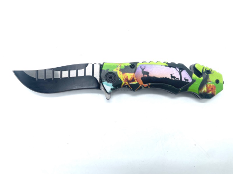 Photo 2 of SE Spring Assisted Clip Point Folding Knife  Window Breaker And Seatbelt Cutter- Multi Colored W Deer