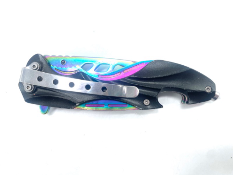 Photo 4 of Oil Slick Blade Spring Assist Knife with glass breaker and bottle opener. 4.5" Closed With Clip.