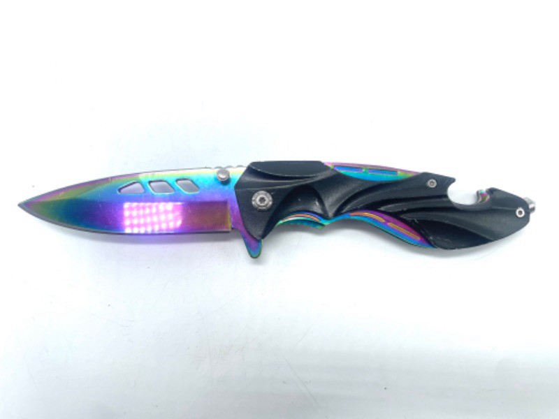Photo 3 of Oil Slick Blade Spring Assist Knife with glass breaker and bottle opener. 4.5" Closed With Clip.