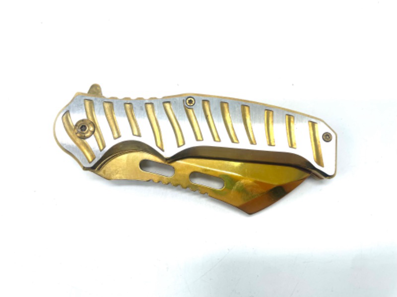 Photo 1 of Gold And Silver Folding Pocket Knife With Clip