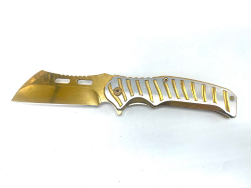 Photo 2 of Gold And Silver Folding Pocket Knife With Clip