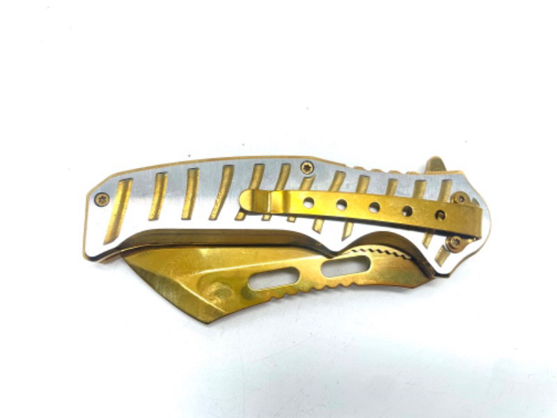 Photo 3 of Gold And Silver Folding Pocket Knife With Clip