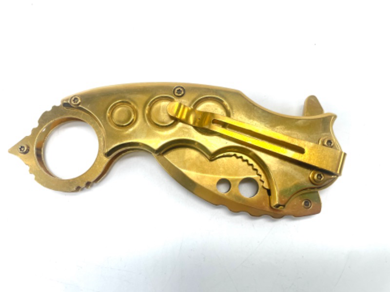 Photo 1 of Gold Pocket Knife