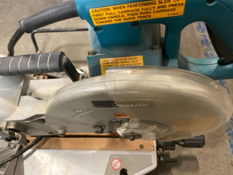 Photo 3 of MAKITA- 1650W Table Mitre Saw-ITEM IS USED Table Is Not Included. 
