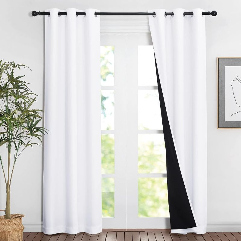 Photo 1 of NICETOWN White Blackout Curtains 84 inches Long, Full Light Blocking Drapes with Black Liner for Nursery, Noise Reducing Thermal Insulated Draperies for Doorway (2 Pieces, 37" Wide Each Panel)
