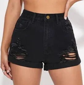 Photo 1 of Ripped Jean Black Shorts Size Large.