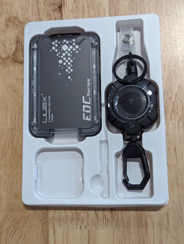Photo 4 of LIUGX Retractable Badge Holders, Heavy Duty Retractable Keychain, Carbon Fiber-Texture, Durable ID Card Holder (Holds 4 Cards), with 31.5” Retractable Badge Reel Key Chain, 10,000+ Rebound
