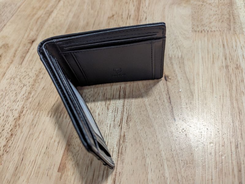 Photo 3 of GSOIAX Mens Slim Wallet for Men Minimalist Genuine Leather Carbon Fiber Rfid Blocking Bifold Credit Card Holder With Gift Box (Black)