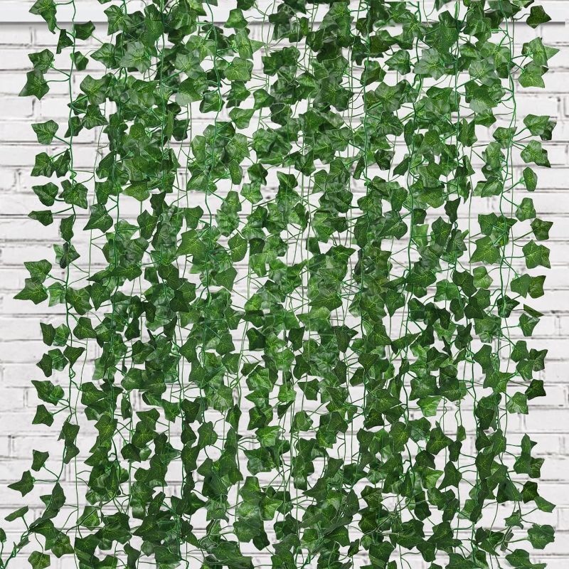 Photo 1 of RECUTMS Fake Vines 24 Pack 173 FT Artificial Ivy Leaves Wall Decor Greenery Garland Hanging Plant Leaf Vines for Room Garden Office Wedding
