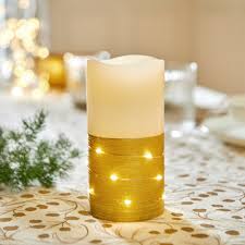 Photo 1 of 5.75" Decorative LED Glimmer and Glow Flameless Candle - Gold