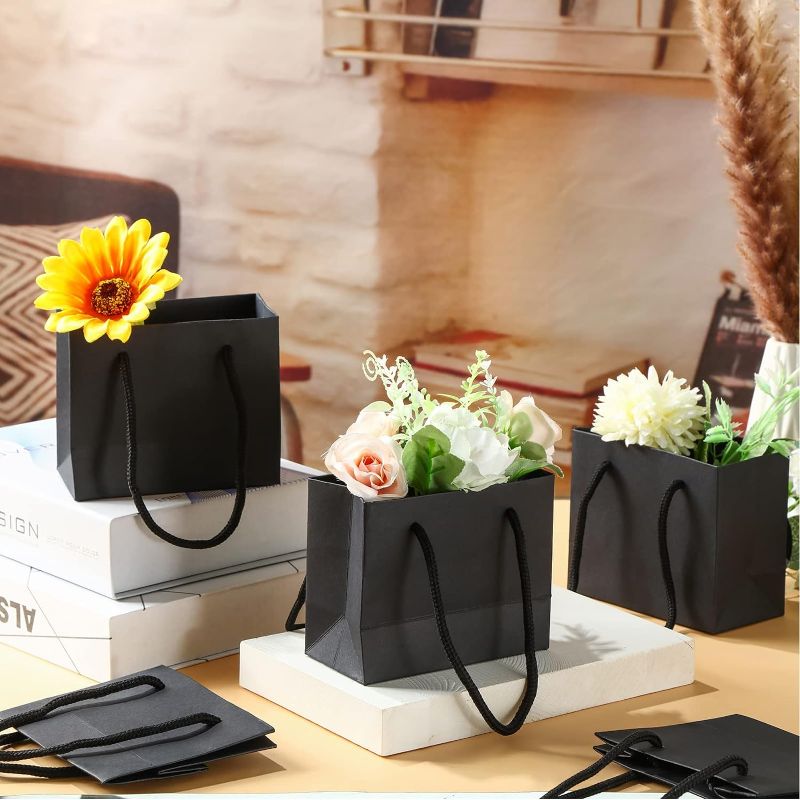 Photo 2 of Yexiya Extra Small Black Gift Bags 3.94 x 4.72 x 2.36 Inch Paper Gift Bags with Handle Mini Gift Wrap for Present Craft Party Favor (50 Pcs)
