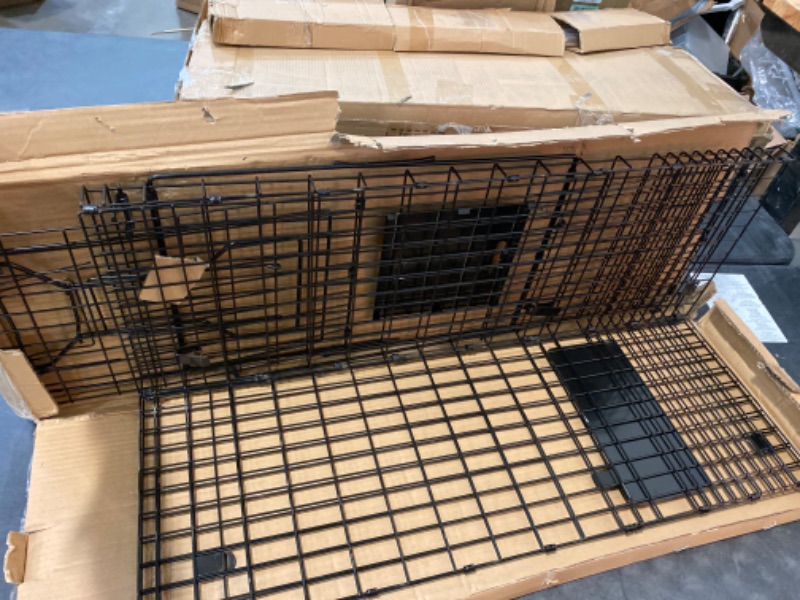 Photo 2 of VASALAID Live Animal Trap Cage, 24 X 7 X 8 Inch Catch & Release, Humane Live Trap Cage Indoor & Outdoor Foldable Trap Cage for Stray Cats, Rabbits, Groundhogs, woodchucks, Black 24X7X8IN