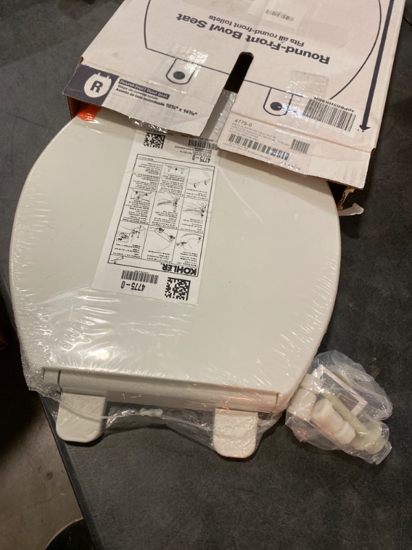 Photo 1 of Kohler K-4775-0 Brevia Round Toilet Seat with Grip-Tight Bumpers, Quick-Attach Hardware, White ,1 Count(Pack of 1) White Round Seatwith