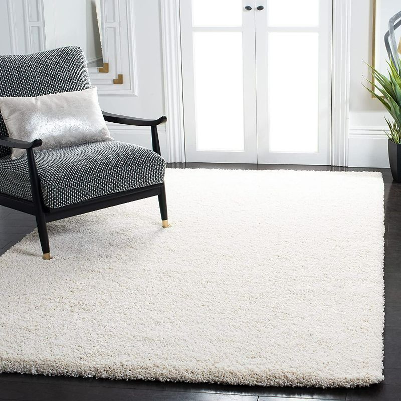 Photo 1 of SAFAVIEH Milan Shag Collection 8' x 10' Ivory SG180 Solid Non-Shedding Living Room Bedroom Dining Room Entryway Plush 2-inch Thick Area Rug
