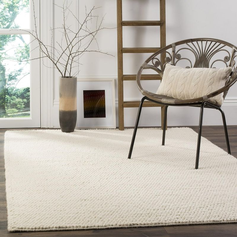 Photo 1 of SAFAVIEH Natura Collection Area Rug - 9' x 12', Ivory, Handmade Wool, Ideal for High Traffic Areas in Living Room, Bedroom 
