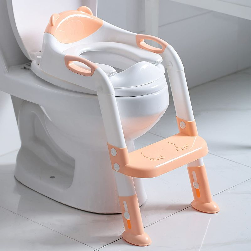 Photo 1 of Fedicelly Potty Training Seat for Toddlers Kids,Toilet Potty Seat,Potty Chair with Step Stool Ladder for Boys Girls Light Orange
