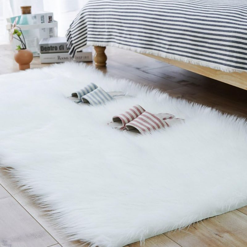 Photo 1 of Carvapet Luxury Soft Faux Sheepskin Fur Rugs for Bedside Floor Mat Area Rug Plush Sofa Cover Throw Rug for Bedroom, White
