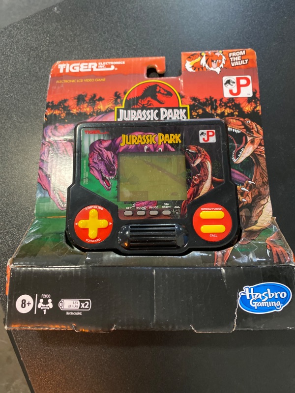 Photo 2 of Tiger Electronics Jurassic Park Electronic LCD Video Game, Retro-Inspired 1-Player Handheld Game, Ages 8 and Up
