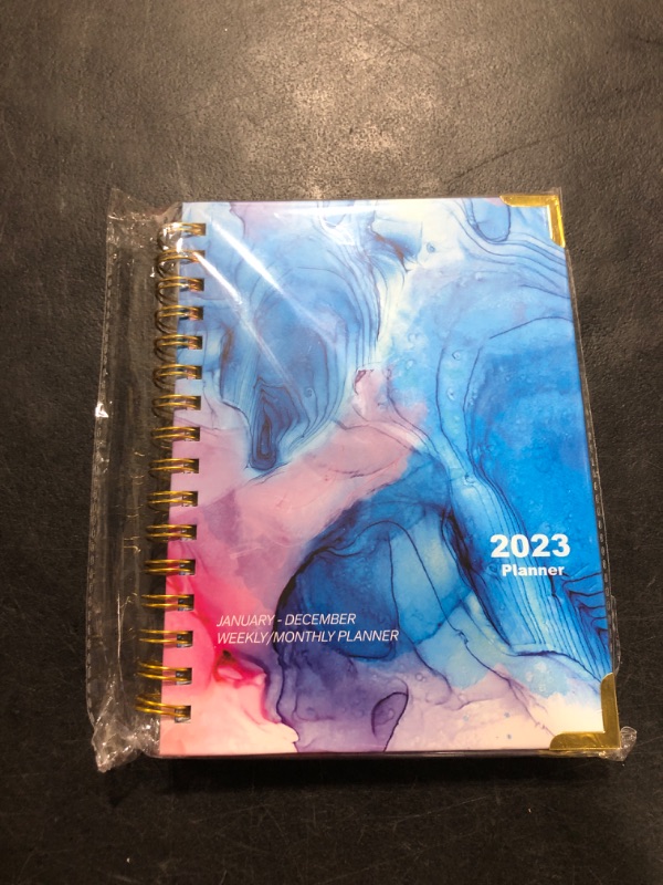 Photo 2 of 2023 Planner, Jan.- Dec. 2023, Weekly/ Monthly Planner with Tabs, Front Pocket, 6.5" x 8.5" x .75", Medium Size, Hardcover Front + Back, Thick Pages + Twin Wire Binding, Daily Organizer