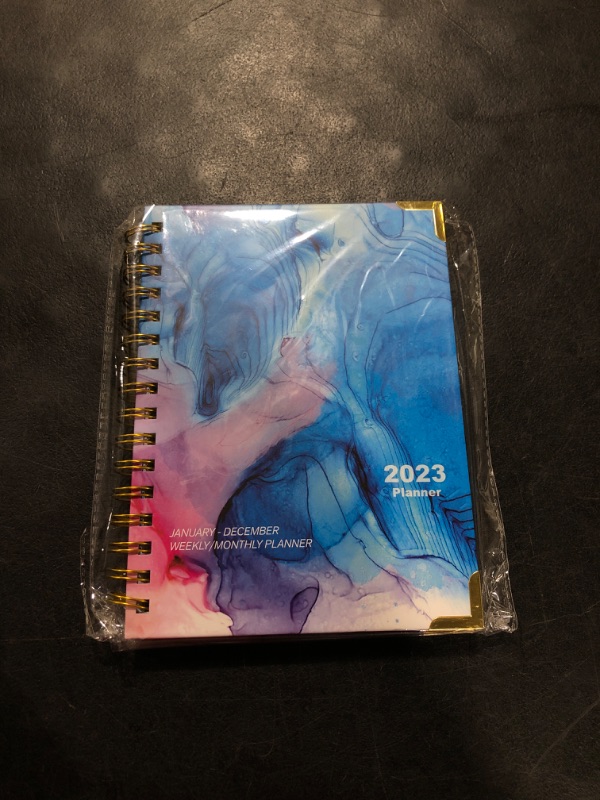 Photo 2 of 2023 Planner, Jan.- Dec. 2023, Weekly/ Monthly Planner with Tabs, Front Pocket, 6.5" x 8.5" x .75", Medium Size, Hardcover Front + Back, Thick Pages + Twin Wire Binding, Daily Organizer
