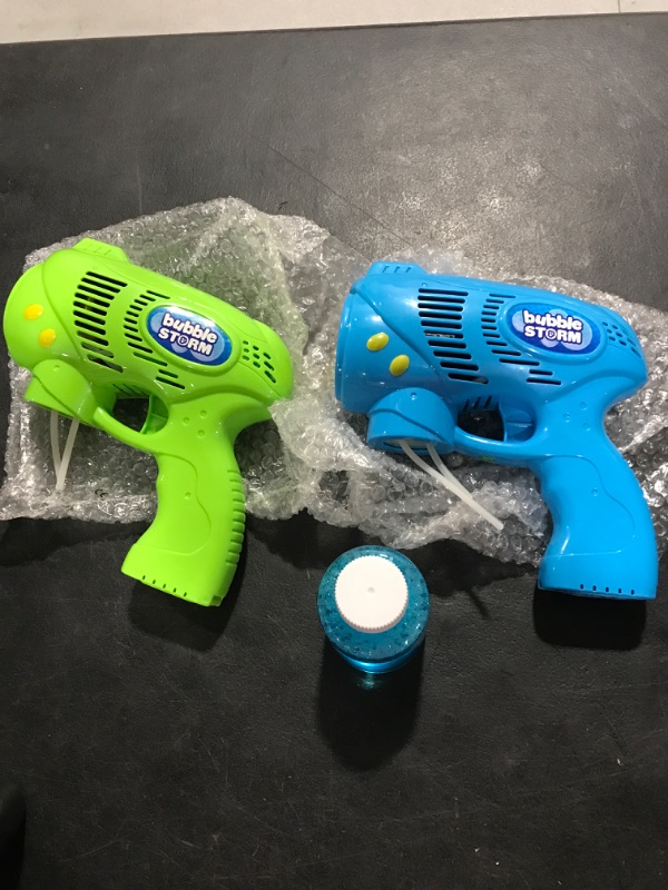 Photo 1 of BLUE AND GREEN BUBBLE GUNS 