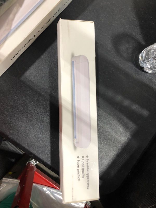 Photo 1 of Plastic Wrap Cutter, Food Freshness Dispenser Preservative Film Unwinding Cutting Foil Wax Paper Cling Wrap Kitchen Accessories - Easy to Use, Just Pull, Press, Cut and Wrap

