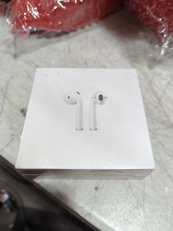 Photo 2 of "FACTORY SEALED"
AirPods with Charging Case