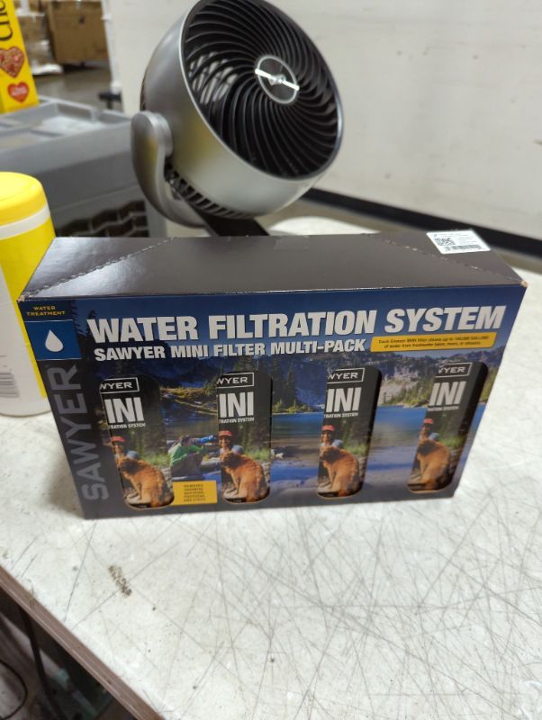 Photo 1 of Sawyer Products SP124 Mini Water Filtration System, Gift 4-Pack, Multi-Color & SP129 Squeeze Water Filtration System w/Two 32-Oz Squeeze Pouches, Straw, and Hydration Pack Adapter Multi-color 4-pack Filtration System + SP129 Filtration System