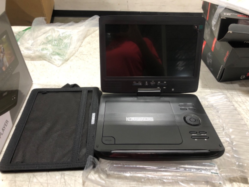 Photo 2 of 12" Portable DVD Player with 5-Hour Rechargeable Battery, 10.1" HD Swivel Display Screen, Support CD/DVD/SD Card/USB, Car Headrest Case, Car Charger, Last Memory Valentines