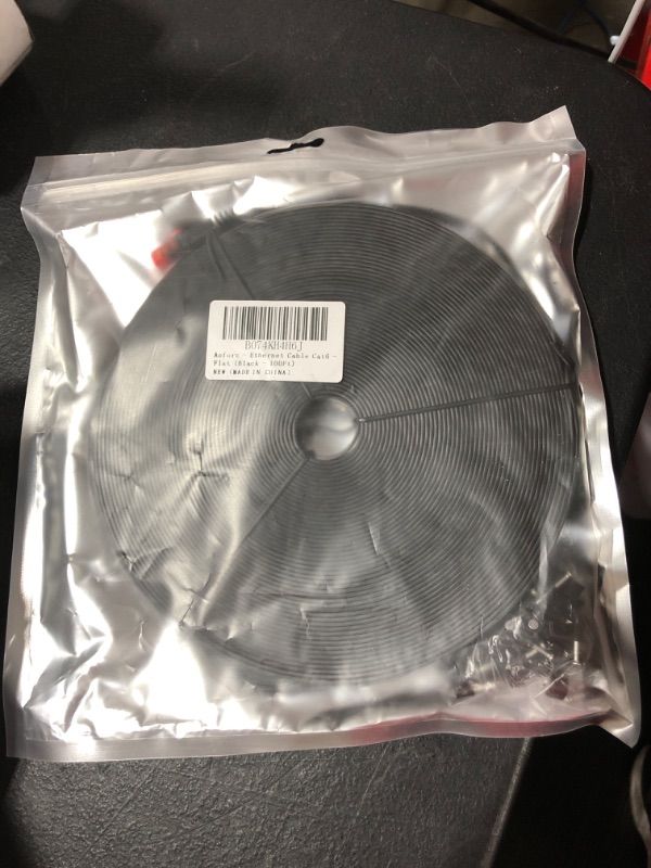 Photo 1 of Aoforz High Speed Cat 6 Ethernet Cable 100 ft,Flat Black Cat 6 Internet Network Patch Cord,with Snagless Rj45 Connectors and Cable Clips(100 Feet) 100FT Black