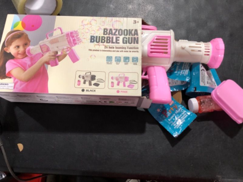 Photo 1 of Bubble Gun Machine for Adults Kids, 24 Hole Bubble Maker, Bubble Blaster Party Favors, Summer Outdoor OutsideToys, Halloween Christmas Birthday Party Gifts for Boys Girls Age 2 3 4 5+ Years Old Pink-h-1