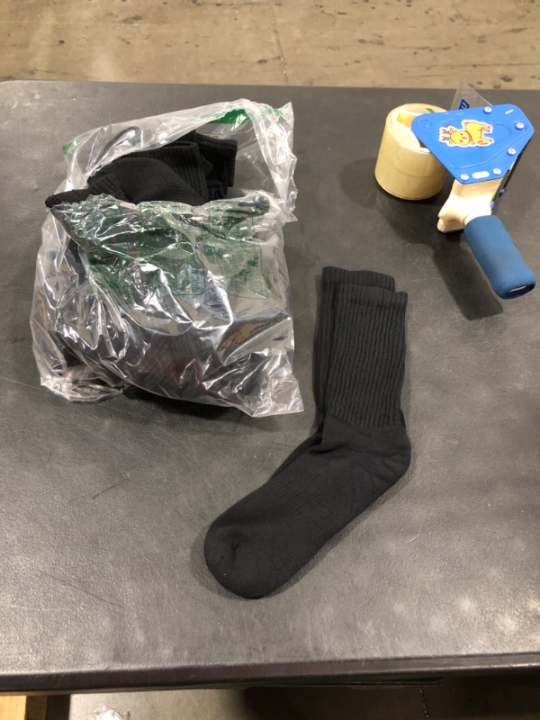 Photo 1 of BAG OF BLACK SOCKS SIZE UNKNOWN 