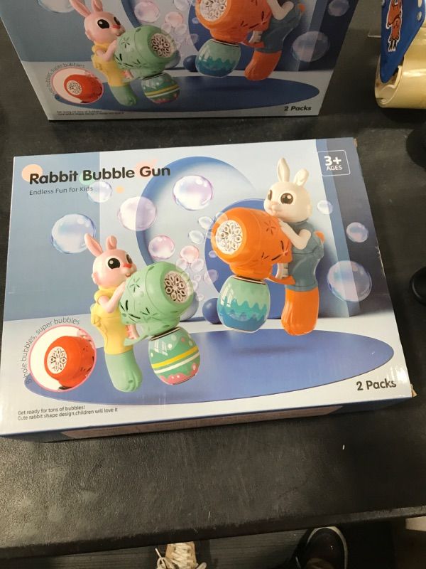 Photo 2 of Bubble Guns for Kids 2 Pack Rabbit Bubble Machine for Toddlers Electric Bubble Toy Automatic Bubble Blower Bubble Maker with 10 Packs Bubble Solutions for Summer Outdoor Party Birthday Gift