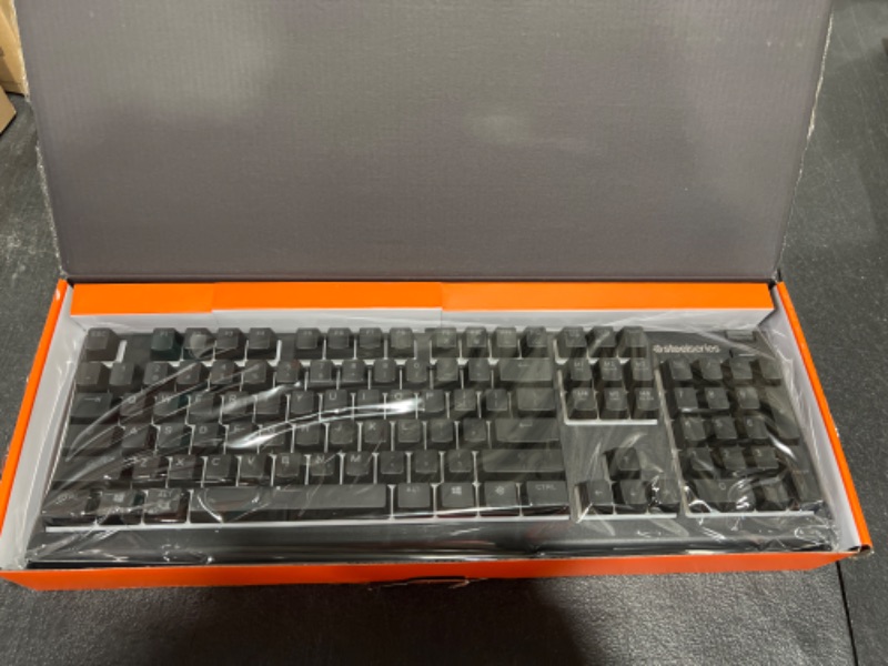 Photo 2 of SteelSeries Apex 3 RGB Gaming Keyboard – 10-Zone RGB Illumination – IP32 Water Resistant – Premium Magnetic Wrist Rest (Whisper Quiet Gaming Switch)