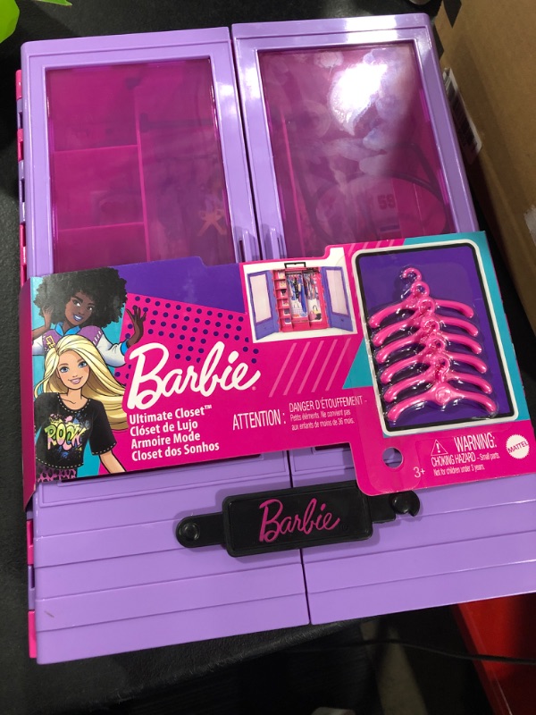 Photo 2 of Barbie Fashionistas Doll & Playset, Ultimate Closet with Barbie Clothes (3 Outfits) & Fashion Accessories Including 6 Hangers

