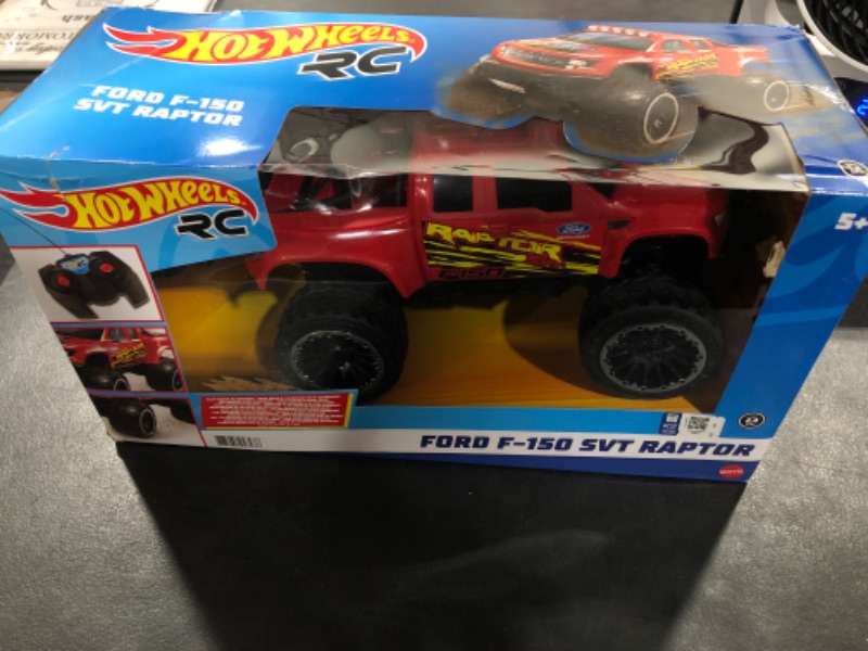 Photo 2 of ?Hot Wheels Remote Control Truck, Red Ford F-150 RC Vehicle With Full-Function Remote Control, Large Wheels & High-Performance Engine, 2.4 GHz With Range of 65 Feet HW FORD TRUCK RC---MINOR BOX DAMAGE 