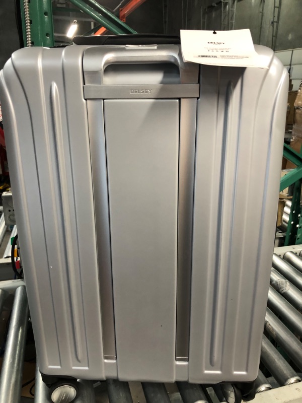 Photo 2 of **DENTED ON THE BOTTOM** DELSEY Paris Titanium Hardside Expandable Luggage with Spinner Wheels, Silver, Checked-Medium 25 Inch Checked-Medium 25 Inch Silver