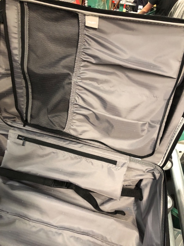 Photo 5 of **DENTED ON THE BOTTOM** DELSEY Paris Titanium Hardside Expandable Luggage with Spinner Wheels, Silver, Checked-Medium 25 Inch Checked-Medium 25 Inch Silver